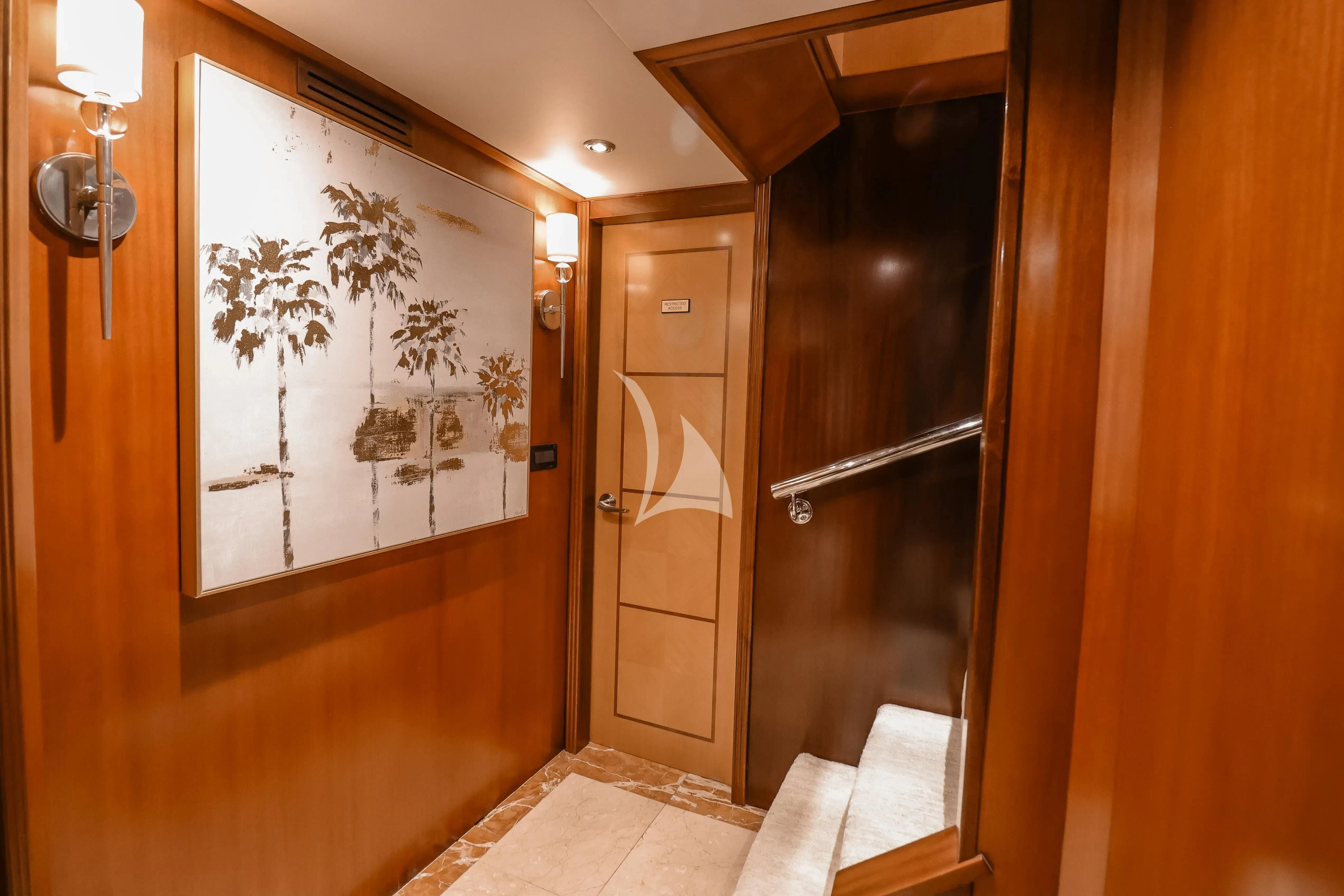 a bathroom with a glass door aboard JUST ENOUGH Yacht for Charter