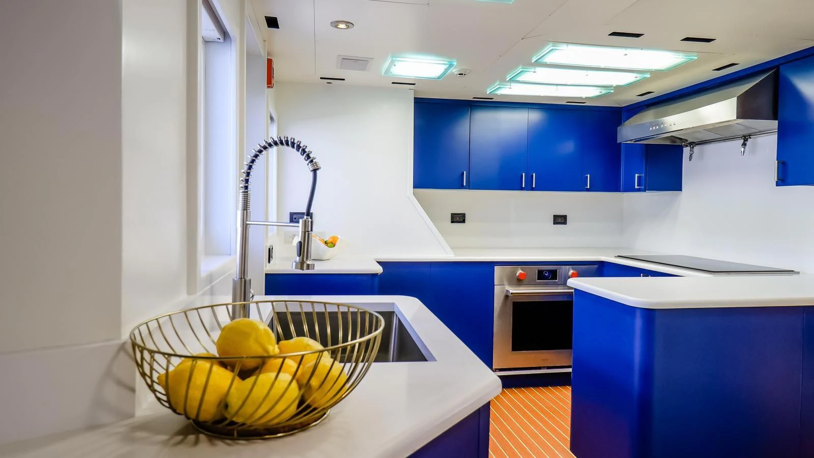 a kitchen with a basket aboard JUST ENOUGH Yacht for Charter