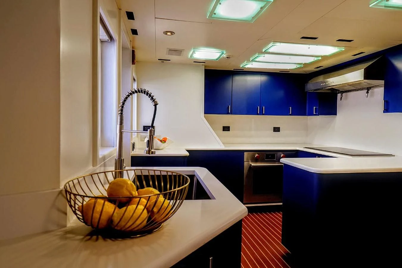 a basket of fruit on a counter aboard JUST ENOUGH Yacht for Charter