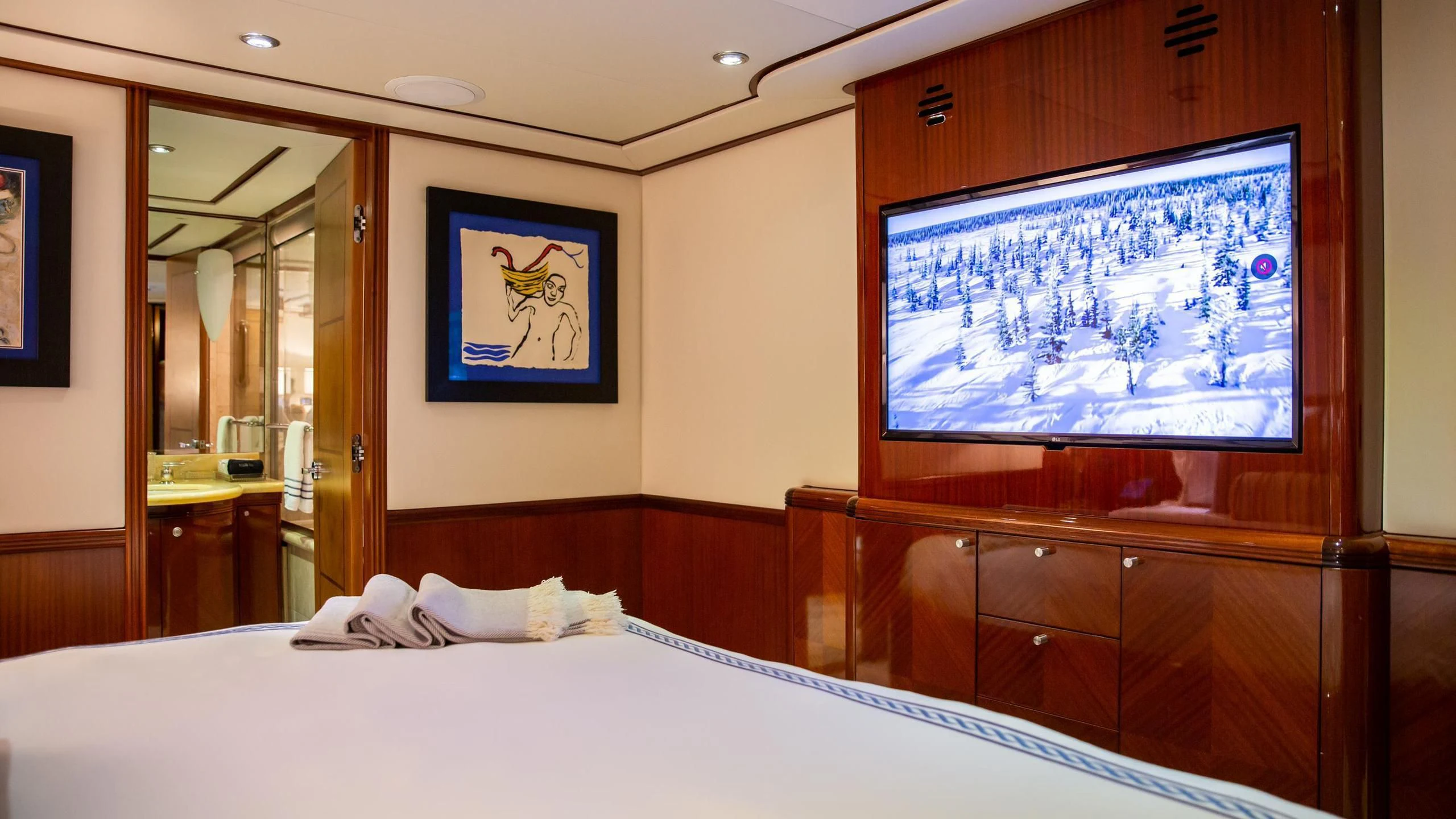 a tv on a wall aboard JUST ENOUGH Yacht for Charter