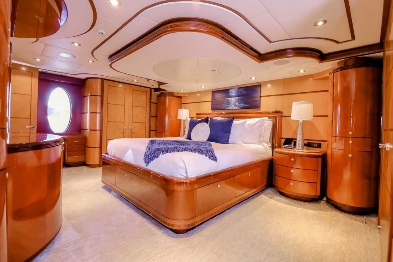 a large bedroom with a large bed aboard JUST ENOUGH Yacht for Charter