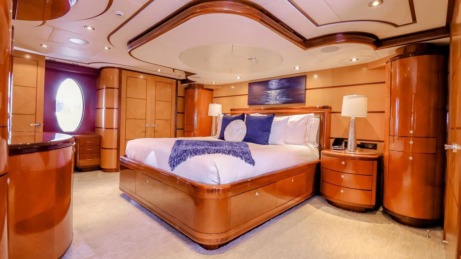 a large bedroom with a large bed aboard JUST ENOUGH Yacht for Charter