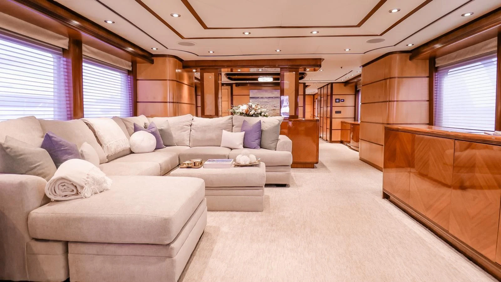 a living room with a couch and a bed aboard JUST ENOUGH Yacht for Charter