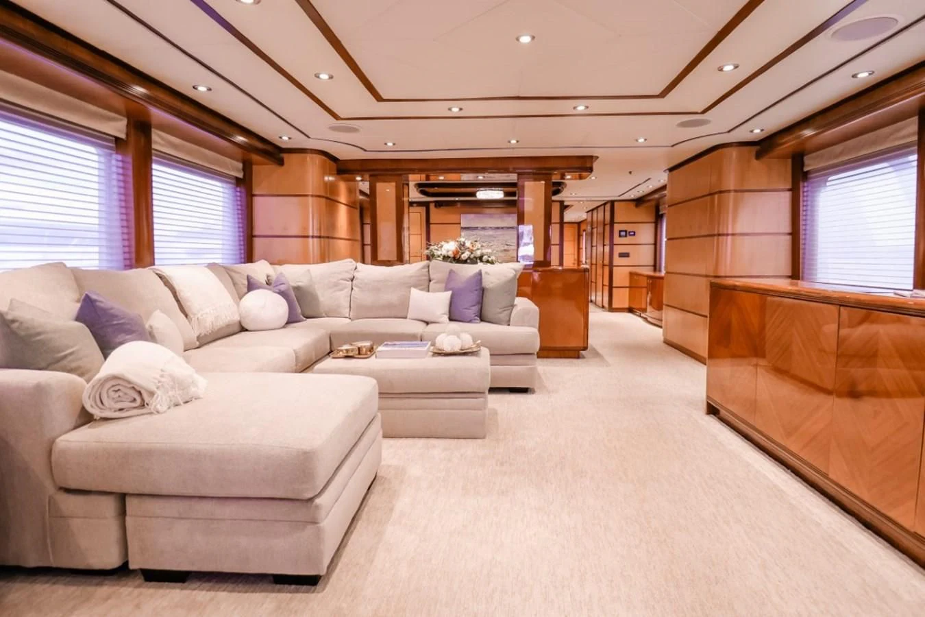 a living room with a couch and a bed aboard JUST ENOUGH Yacht for Charter