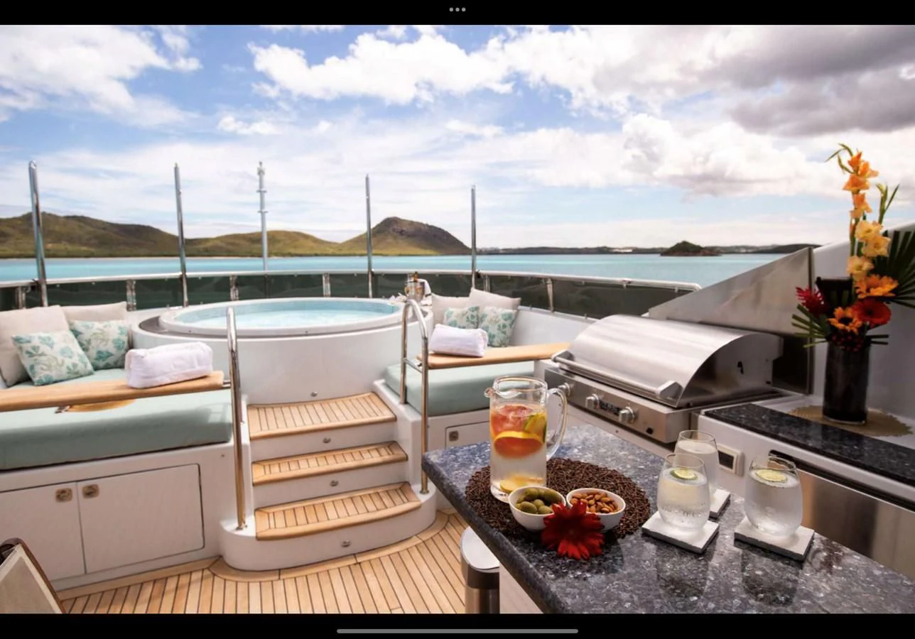 a balcony overlooking a city aboard JUST ENOUGH Yacht for Charter