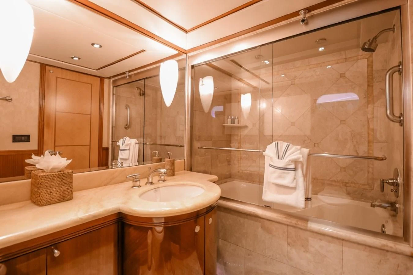 a bathroom with a large mirror aboard JUST ENOUGH Yacht for Charter