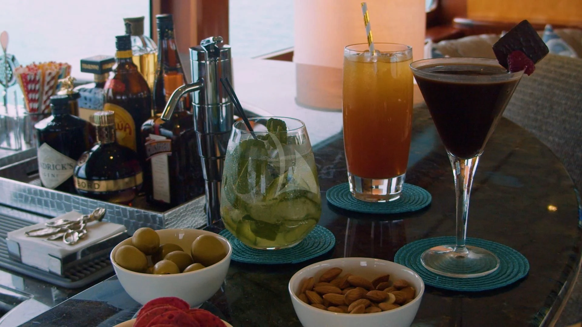 a table with food and drinks aboard JUST ENOUGH Yacht for Charter