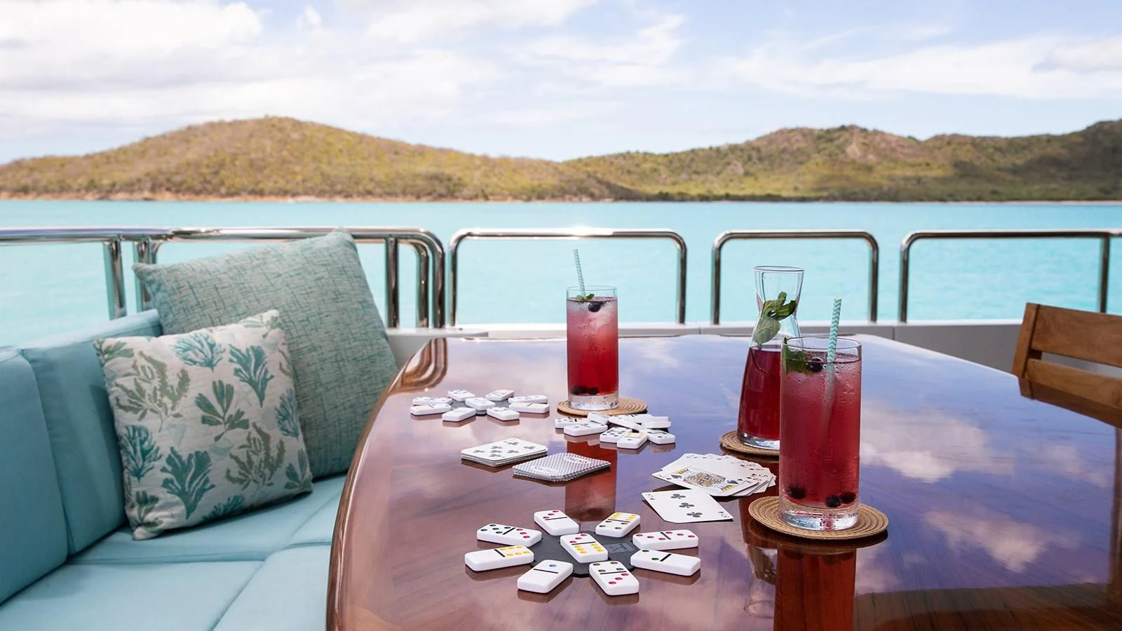 a table with drinks on it aboard JUST ENOUGH Yacht for Charter