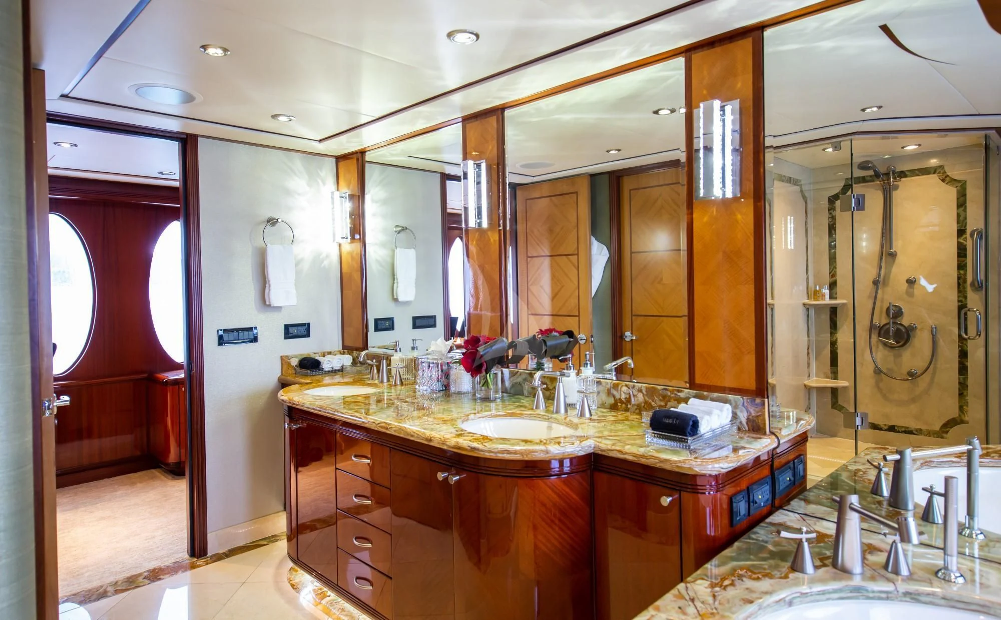 a bathroom with a large mirror aboard JUST ENOUGH Yacht for Charter
