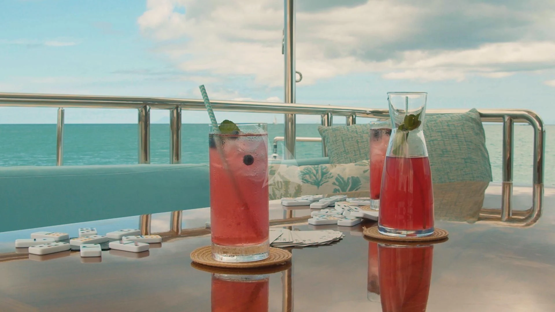 a table with drinks on it aboard JUST ENOUGH Yacht for Charter