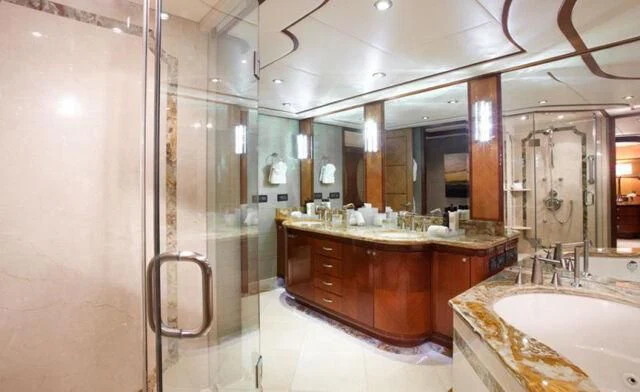 a bathroom with a large mirror aboard JUST ENOUGH Yacht for Charter