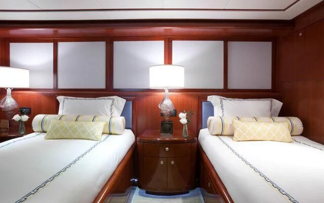 a room with two beds aboard JUST ENOUGH Yacht for Charter