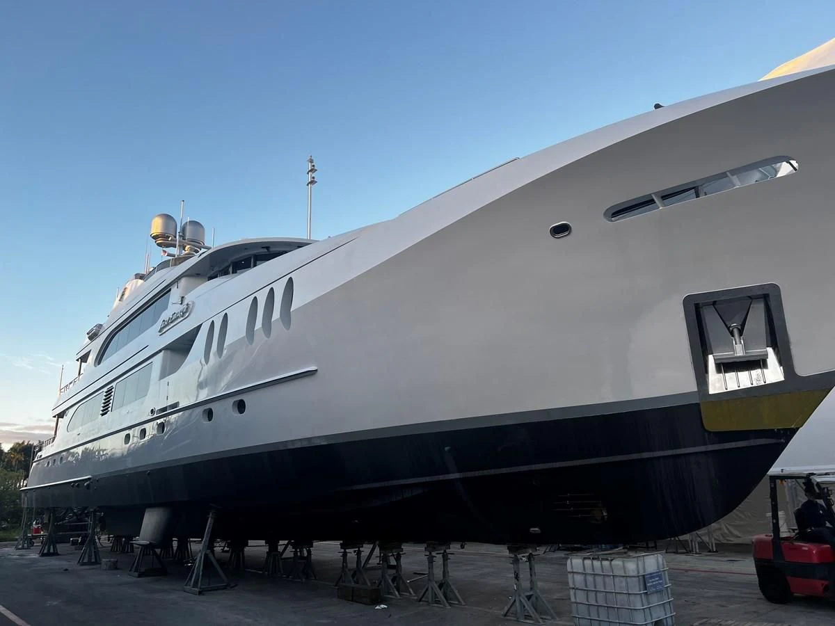 a large white ship aboard JUST ENOUGH Yacht for Charter