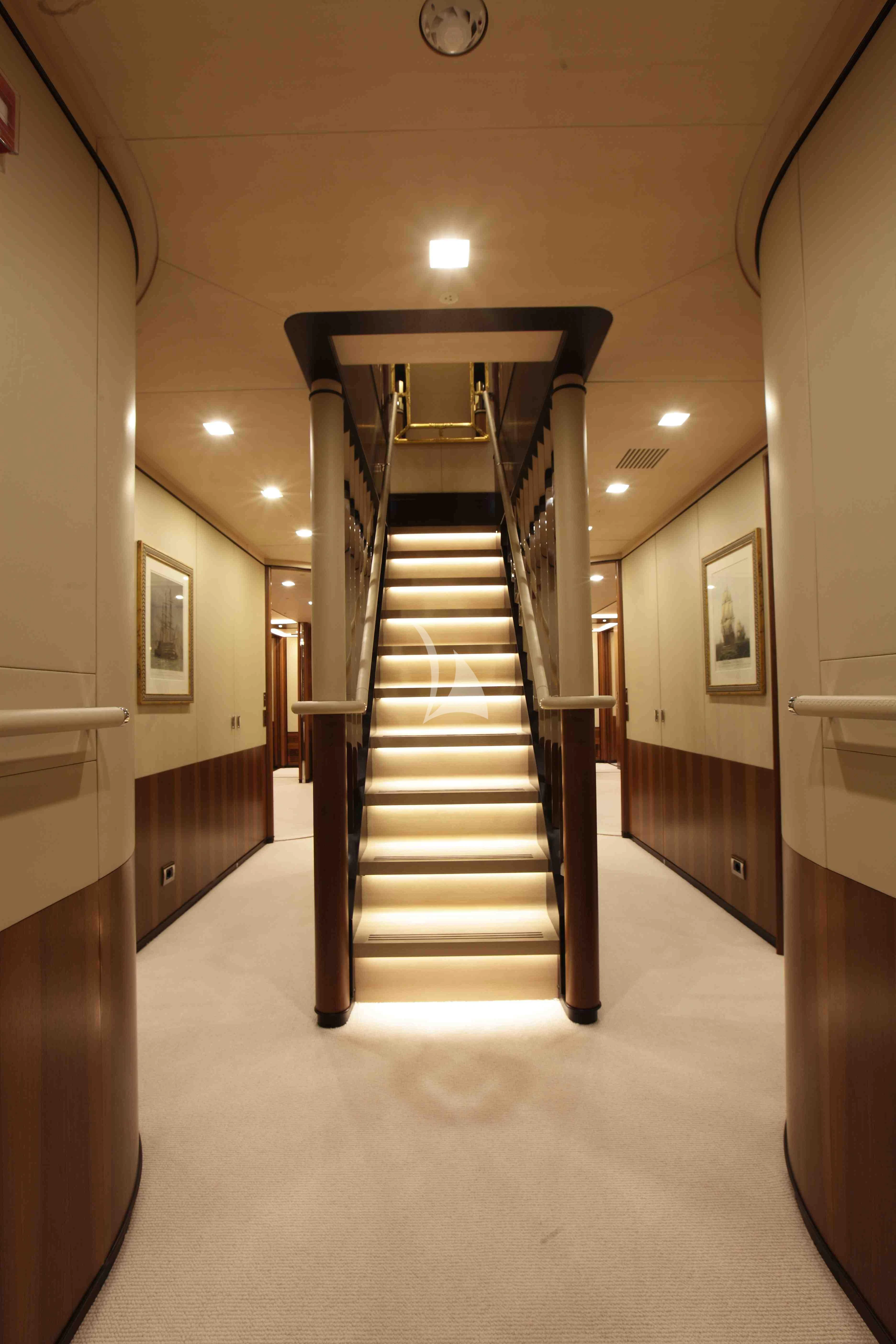 a long hallway with a staircase aboard PERSEUS^3 Yacht for Sale