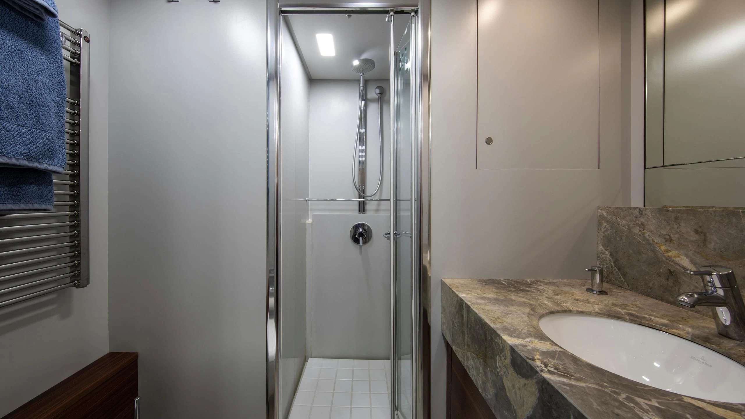 a bathroom with a sink and a shower aboard PERSEUS^3 Yacht for Sale