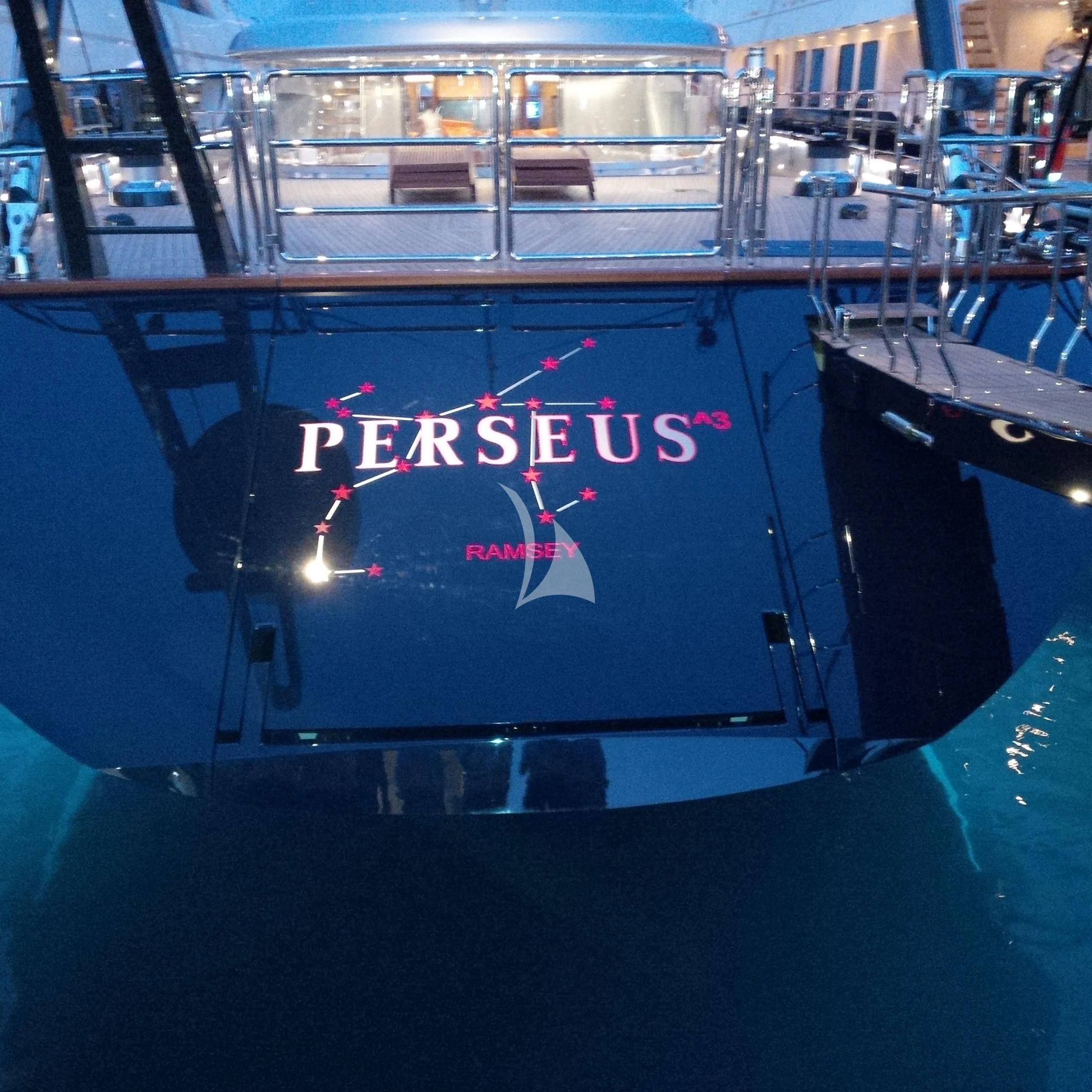 a large blue boat with a sign on it aboard PERSEUS^3 Yacht for Sale