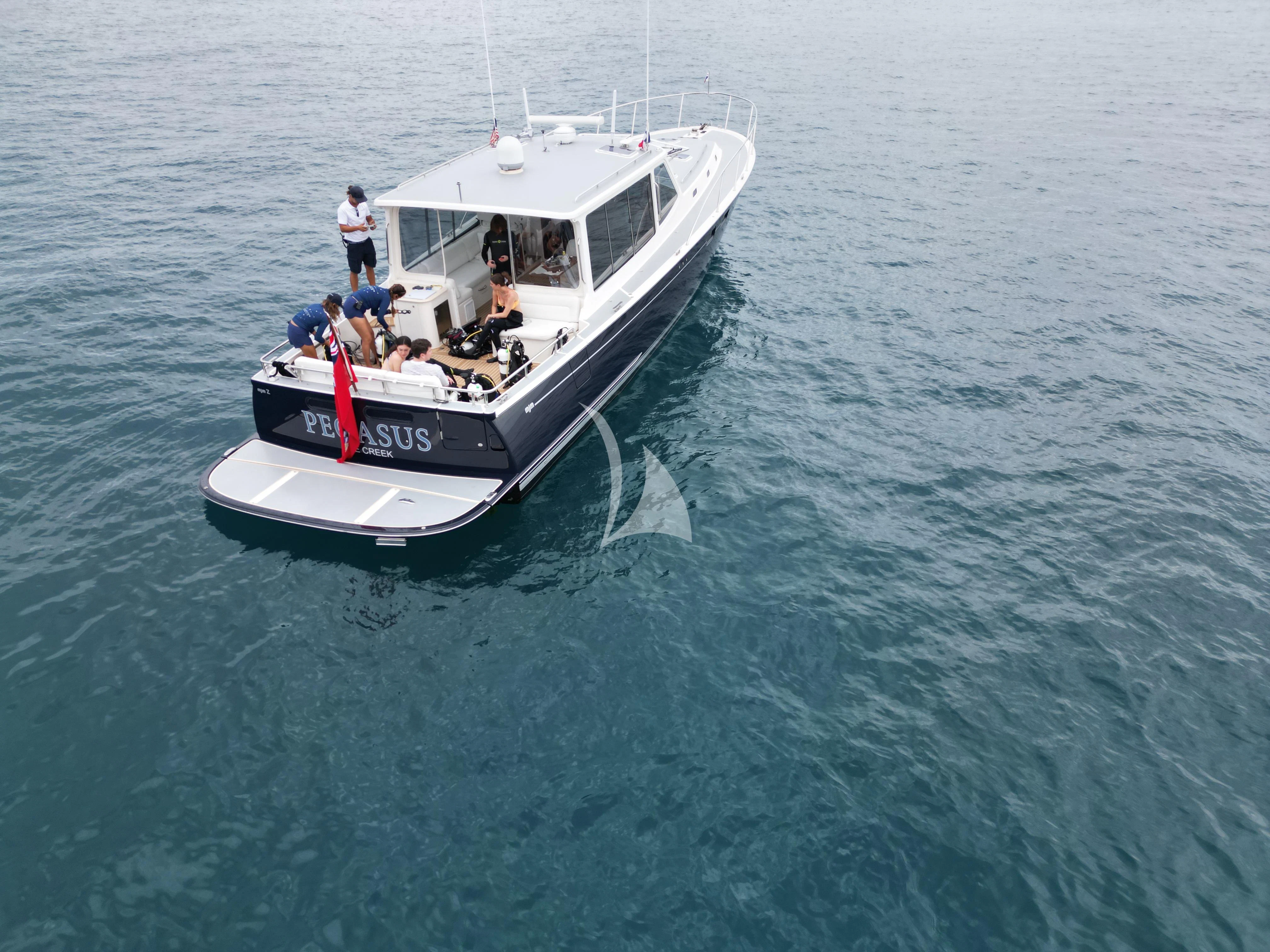 a boat with people on it aboard PERSEUS^3 Yacht for Sale