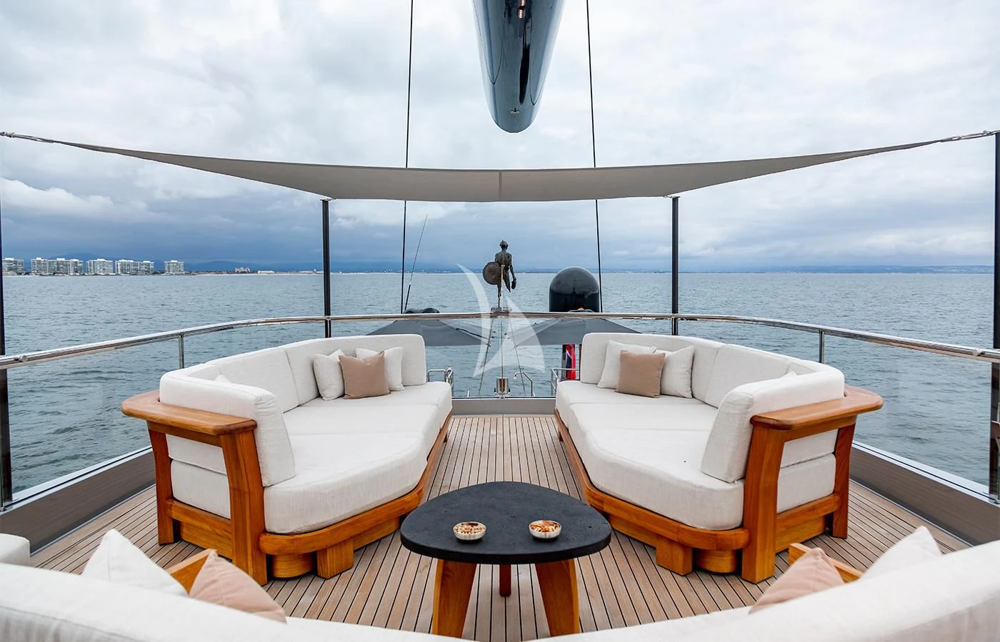 a room with a view of a city and water aboard PERSEUS^3 Yacht for Sale