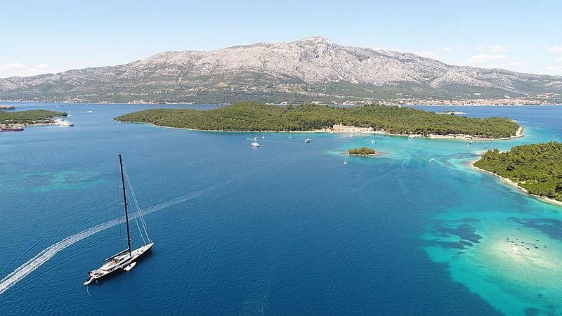 a boat sailing on the water aboard PERSEUS^3 Yacht for Sale