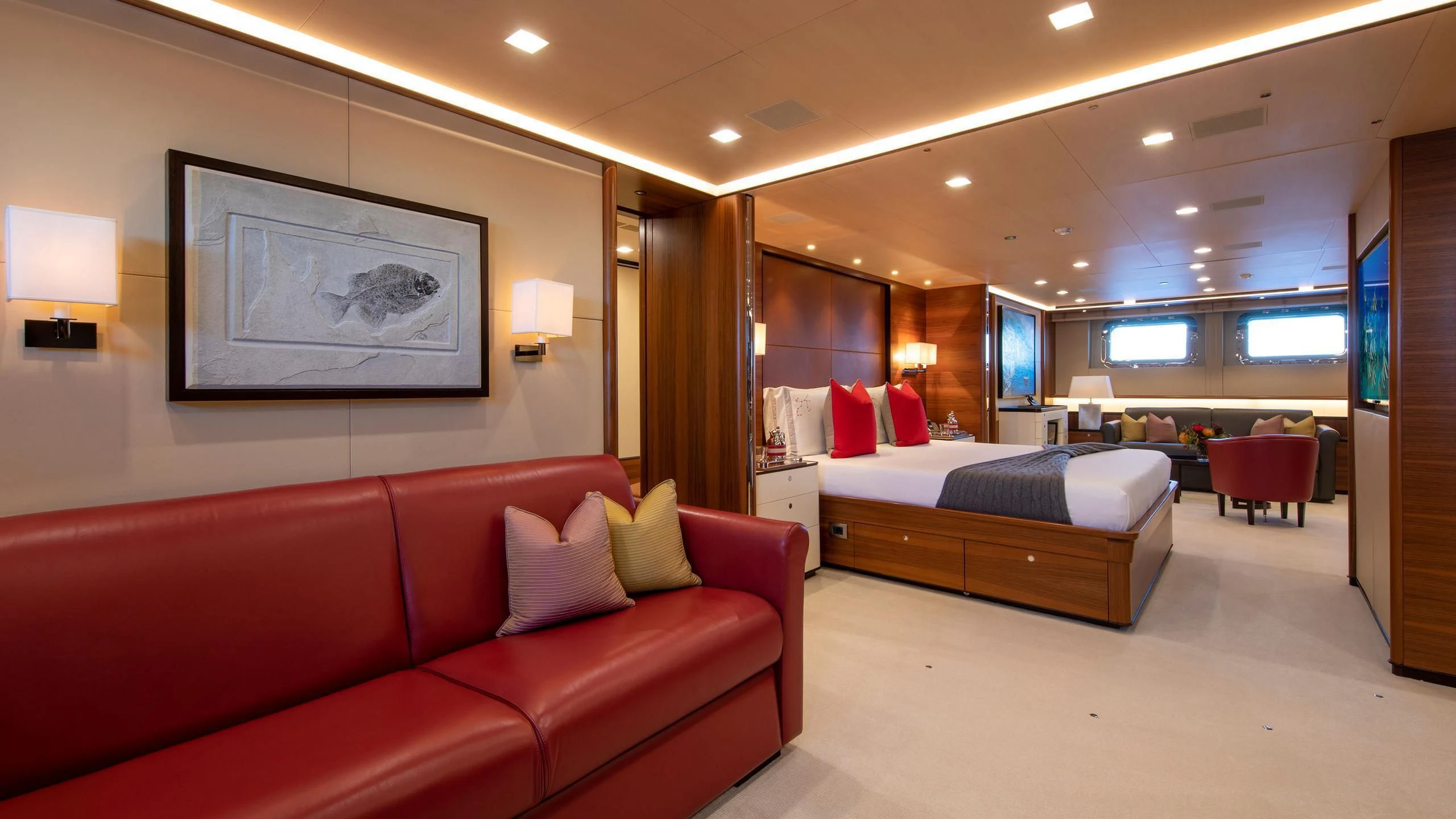 a hotel room with a bed and a couch aboard PERSEUS^3 Yacht for Sale