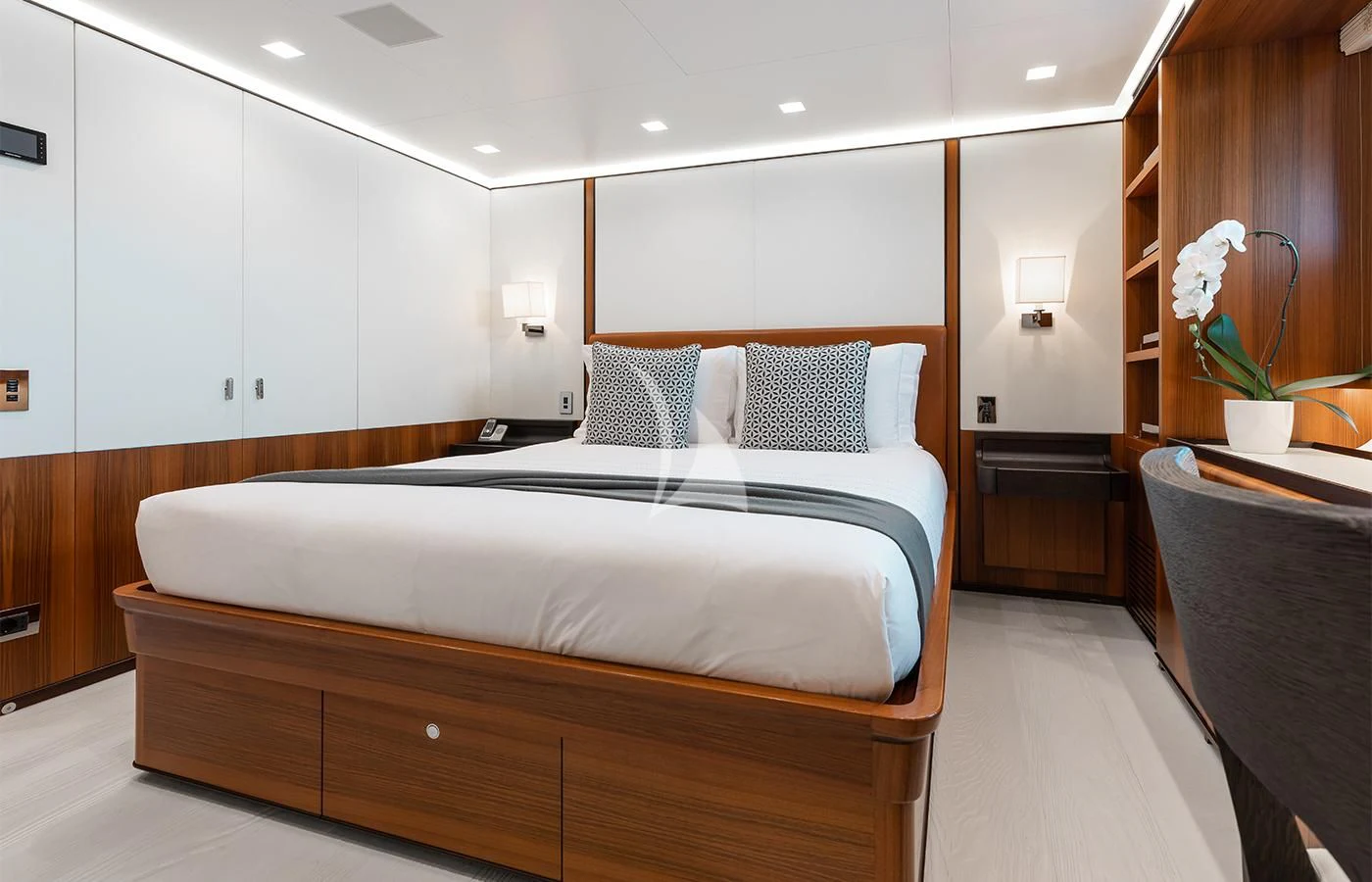 a large bedroom with a large bed aboard PERSEUS^3 Yacht for Sale