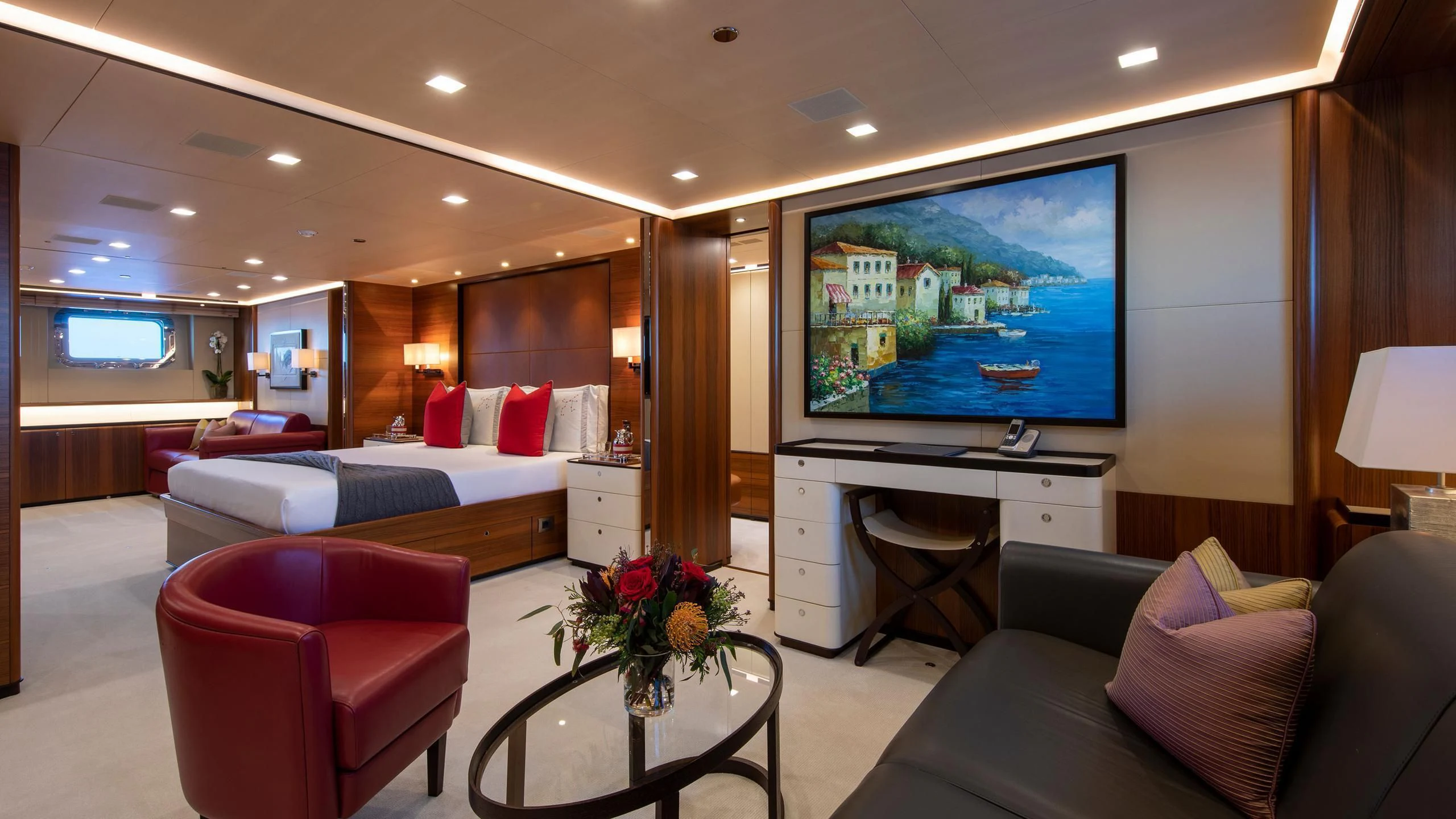 a living room with a large television aboard PERSEUS^3 Yacht for Sale