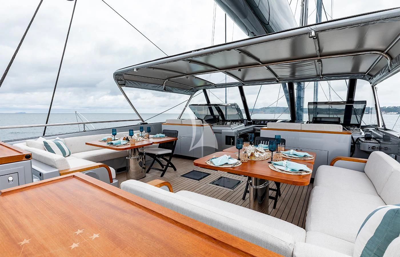 a room with a table and chairs aboard PERSEUS^3 Yacht for Sale