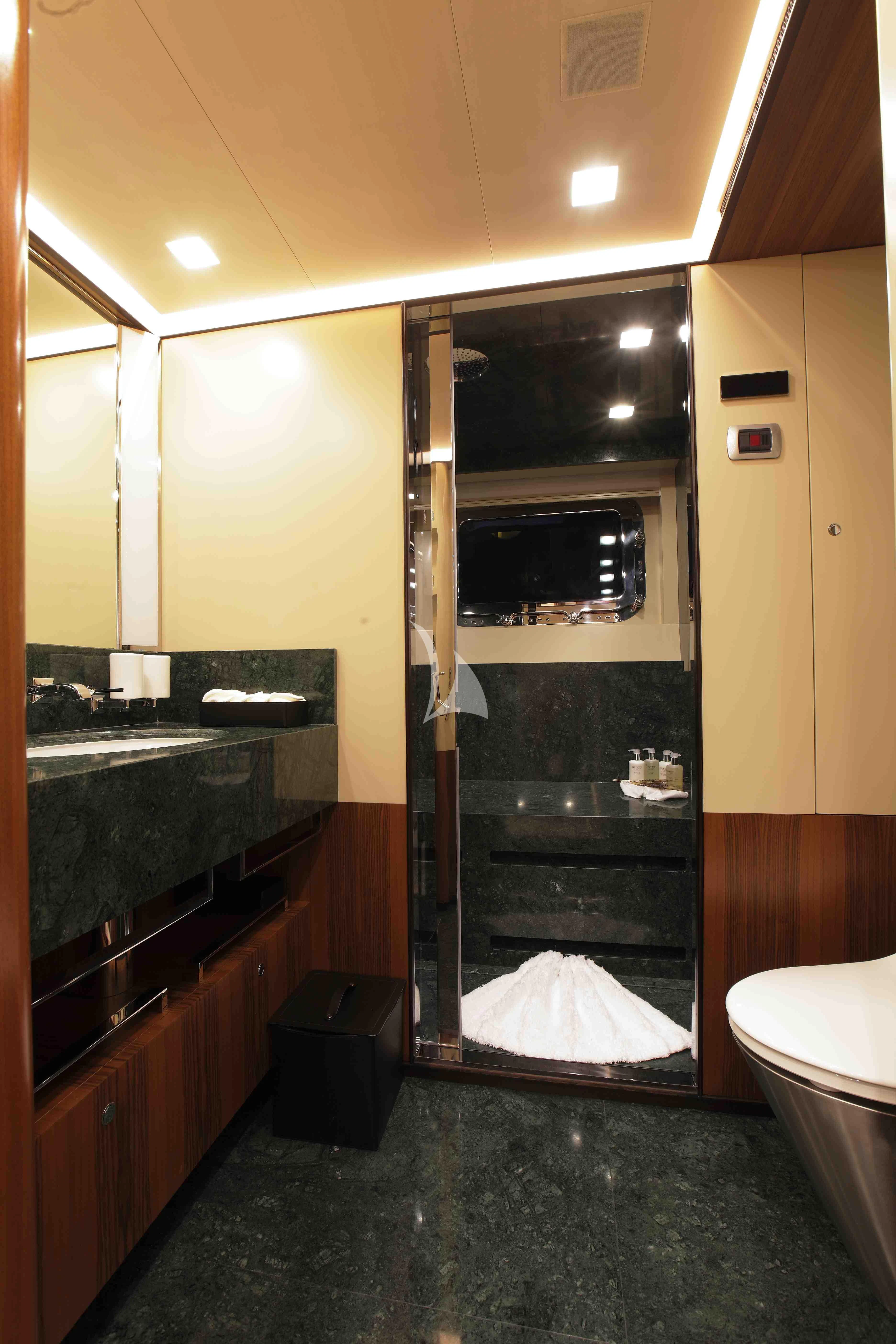 a bathroom with a large mirror aboard PERSEUS^3 Yacht for Sale