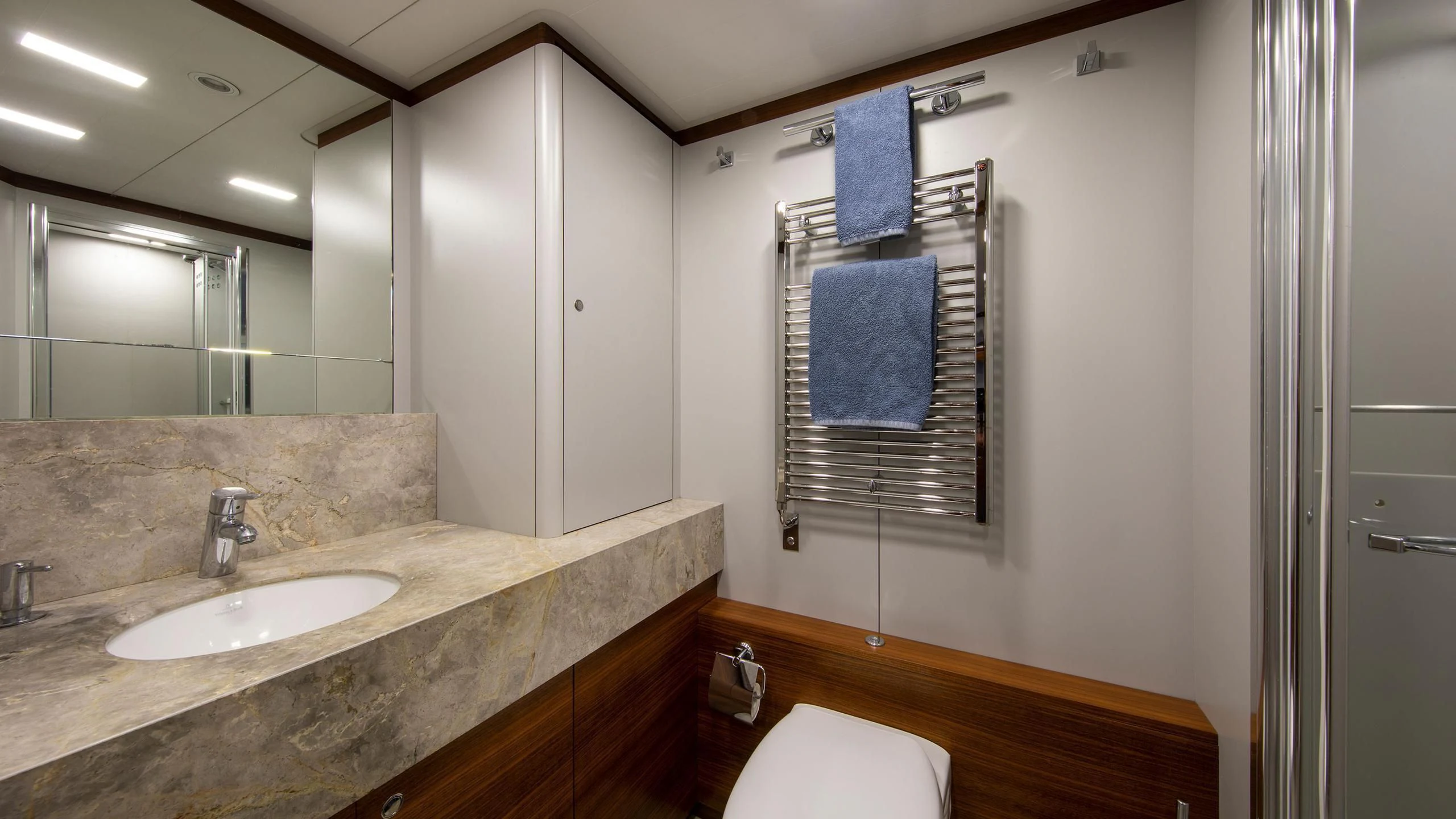 a bathroom with a sink and a mirror aboard PERSEUS^3 Yacht for Sale