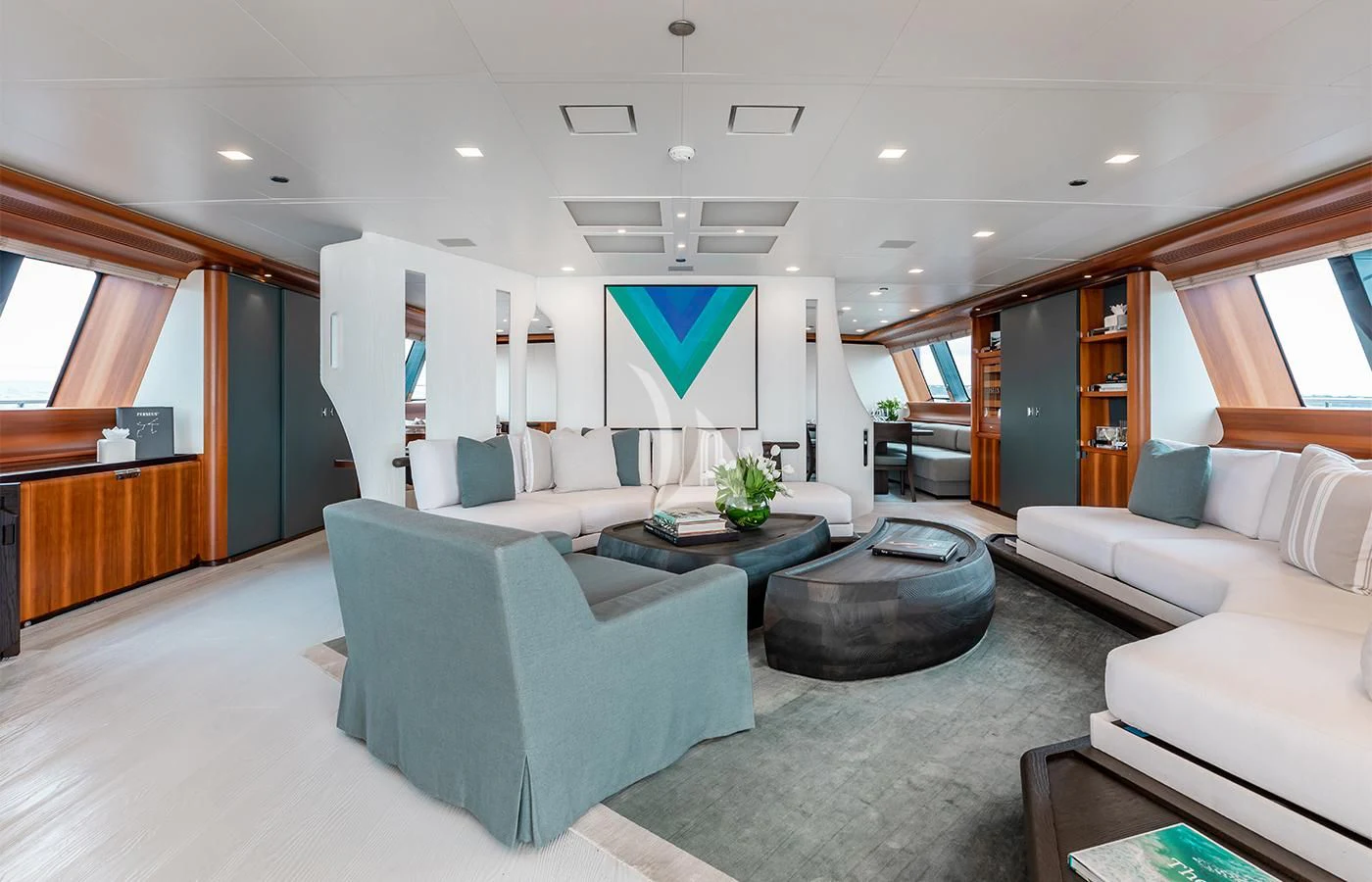 a living room with a couch and a coffee table aboard PERSEUS^3 Yacht for Sale