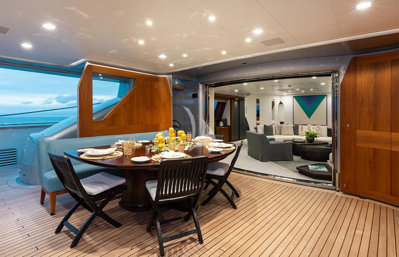 a dining table in a room aboard PERSEUS^3 Yacht for Sale