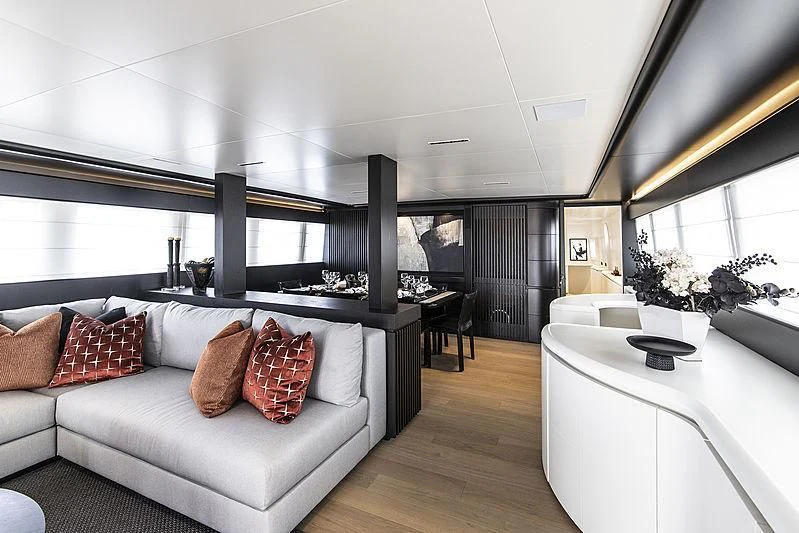 a living room with a large window aboard PROJECT STEEL Yacht for Sale