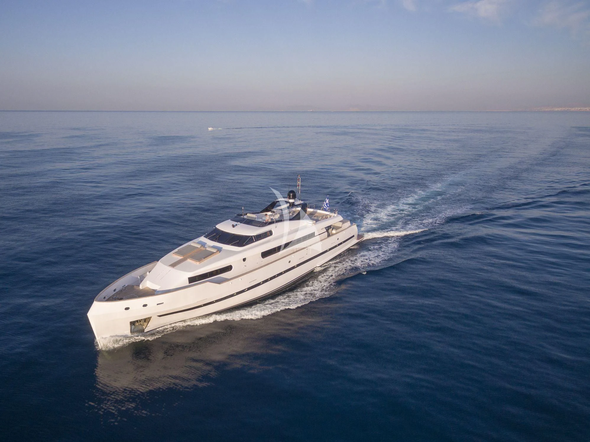 a white yacht in the water aboard PROJECT STEEL Yacht for Sale
