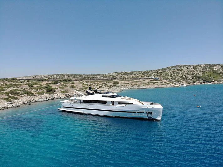 a white boat in the water aboard PROJECT STEEL Yacht for Sale