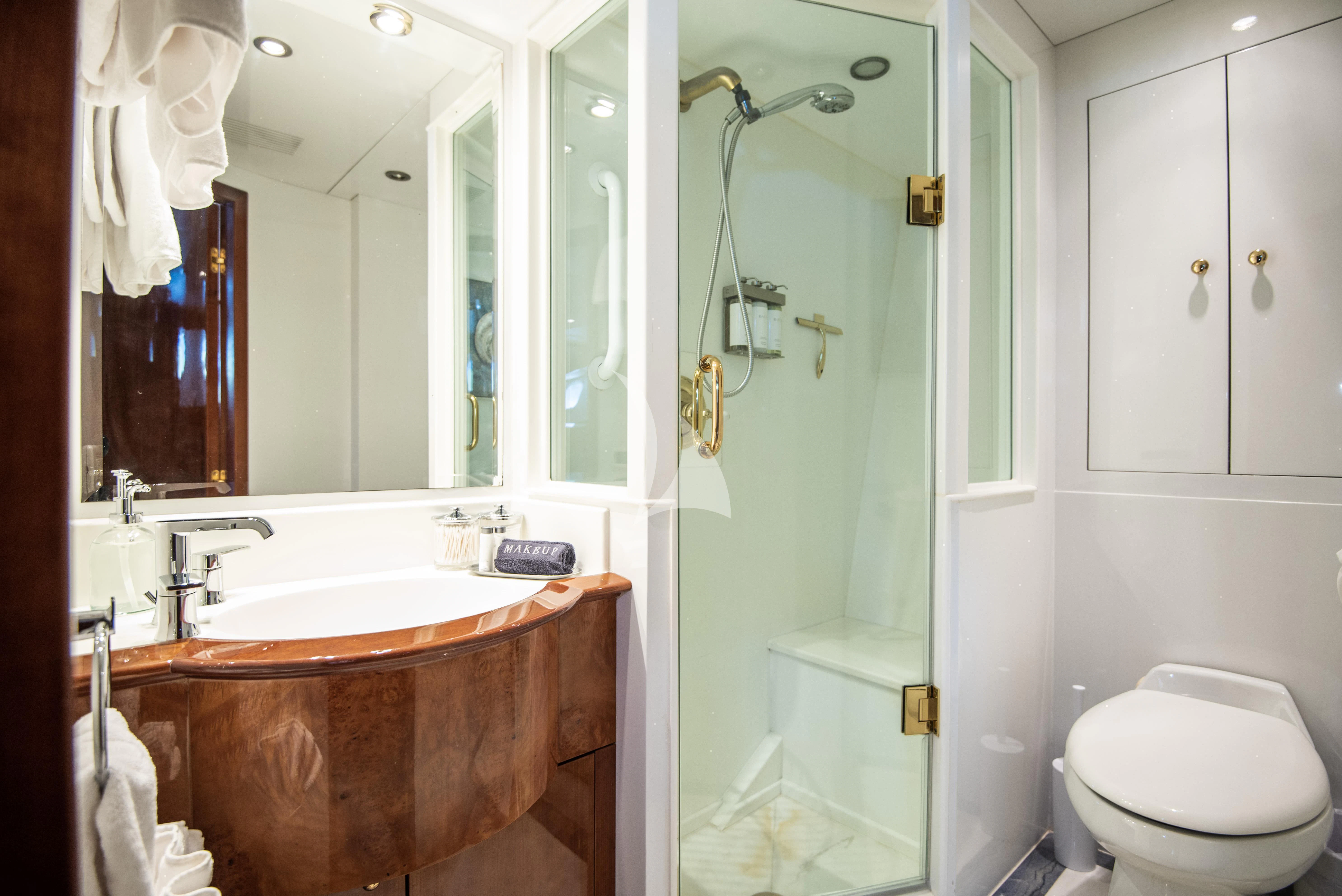 a bathroom with a sink toilet and a shower aboard OUTTA TOUCH Yacht for Sale