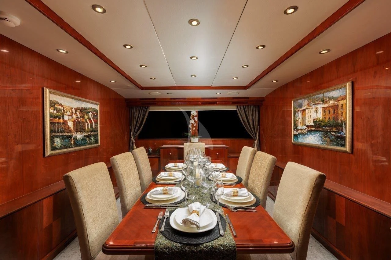 a dining room with a table set aboard OUTTA TOUCH Yacht for Sale