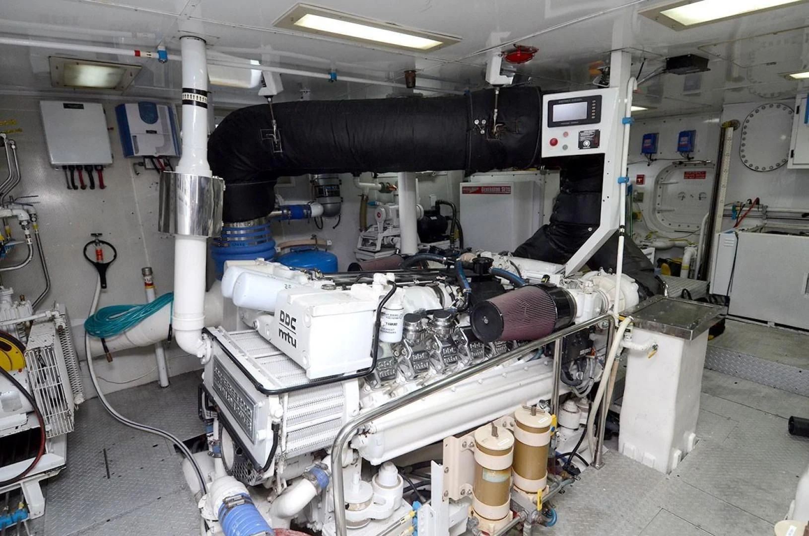 a room with machinery and pipes aboard OUTTA TOUCH Yacht for Sale