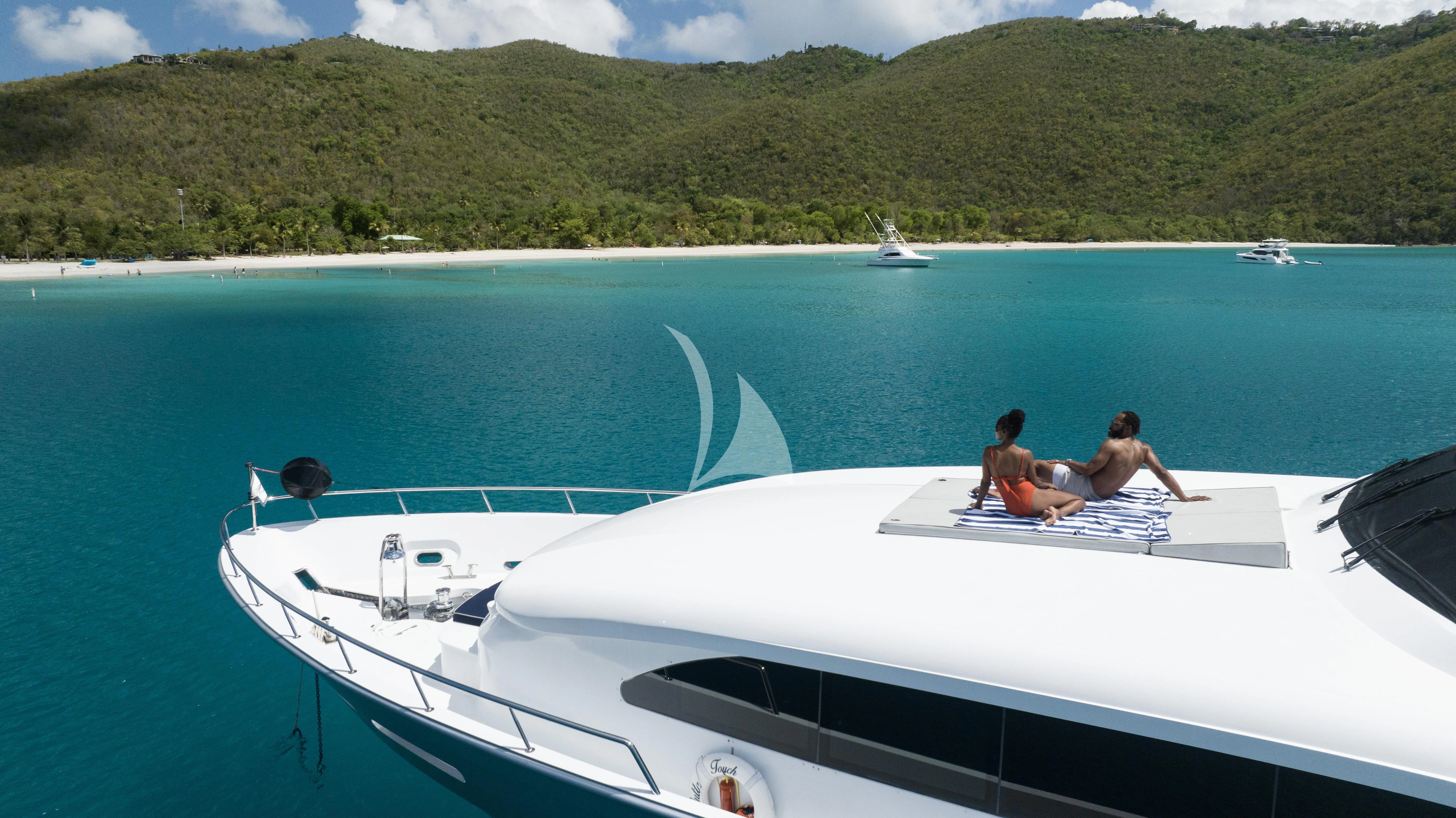 people on a boat aboard OUTTA TOUCH Yacht for Sale