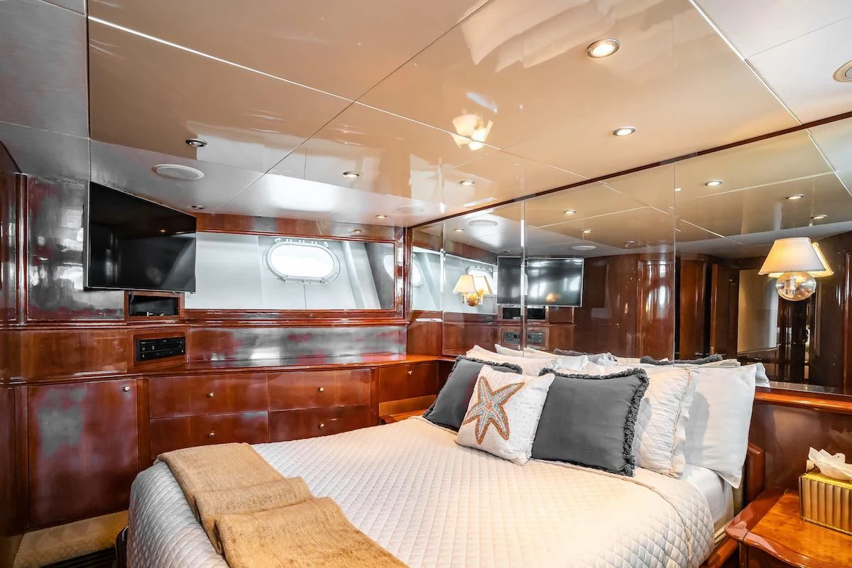 a bed in a room aboard OUTTA TOUCH Yacht for Sale