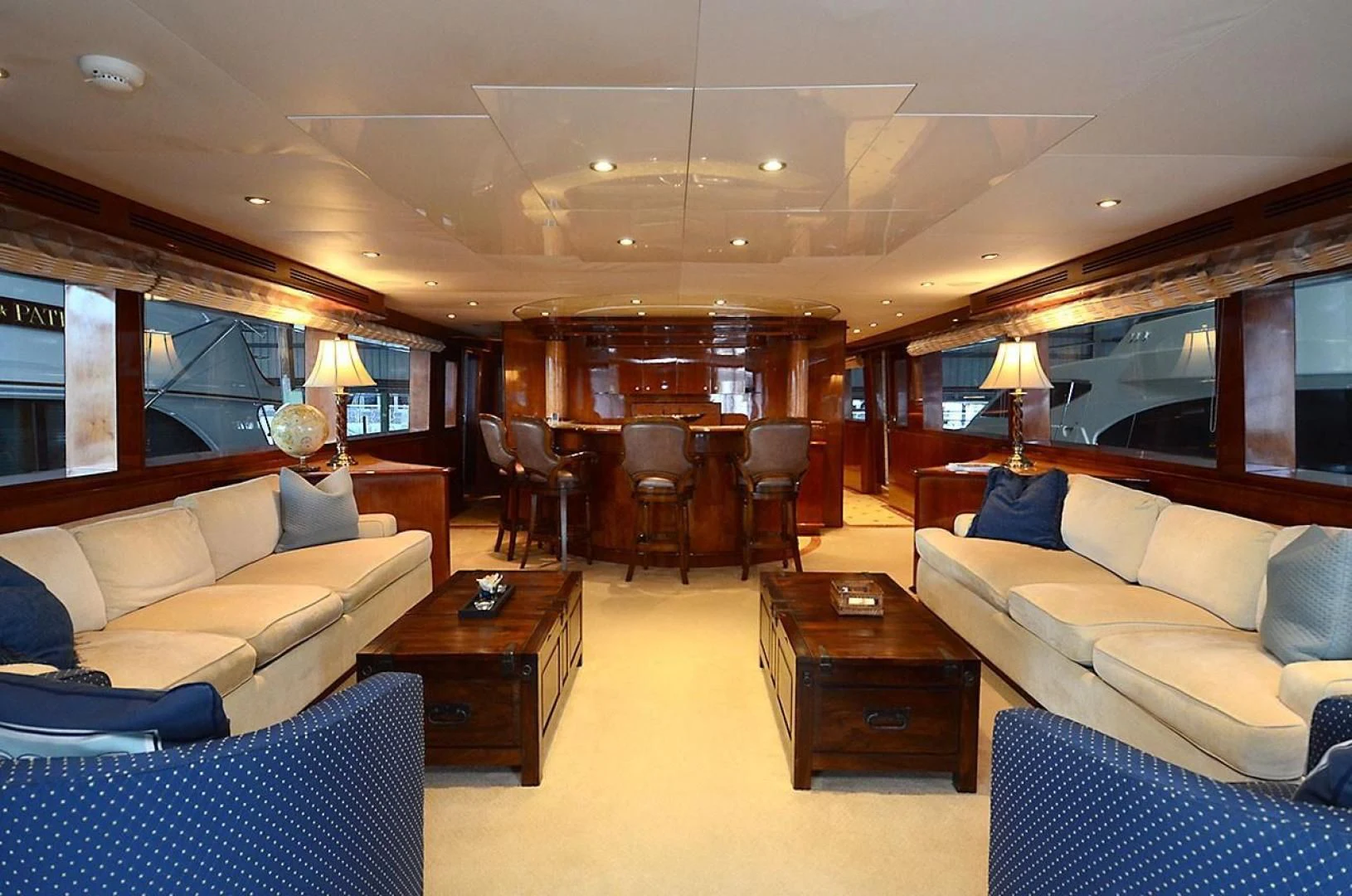a living room with a couch and a coffee table aboard OUTTA TOUCH Yacht for Sale