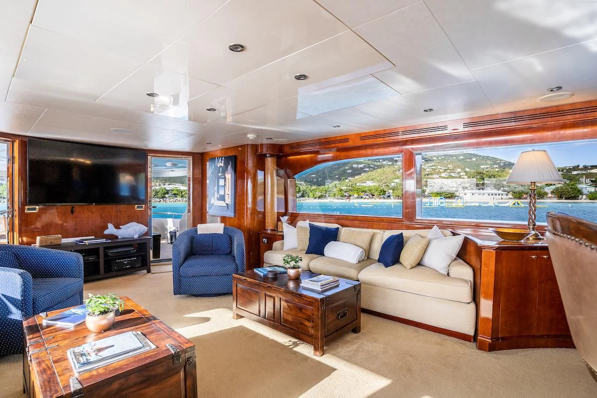 a living room with a large window aboard OUTTA TOUCH Yacht for Sale