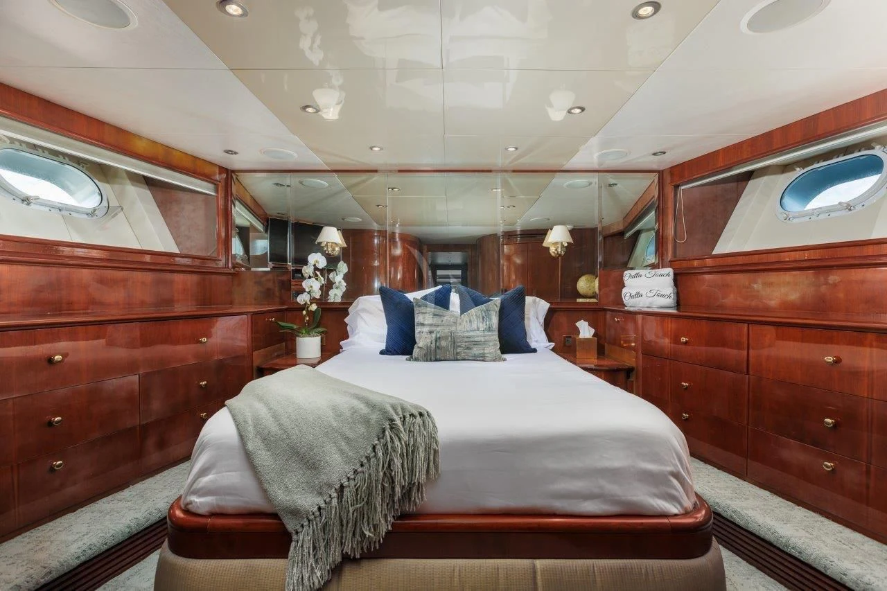a bed in a cabin aboard OUTTA TOUCH Yacht for Sale