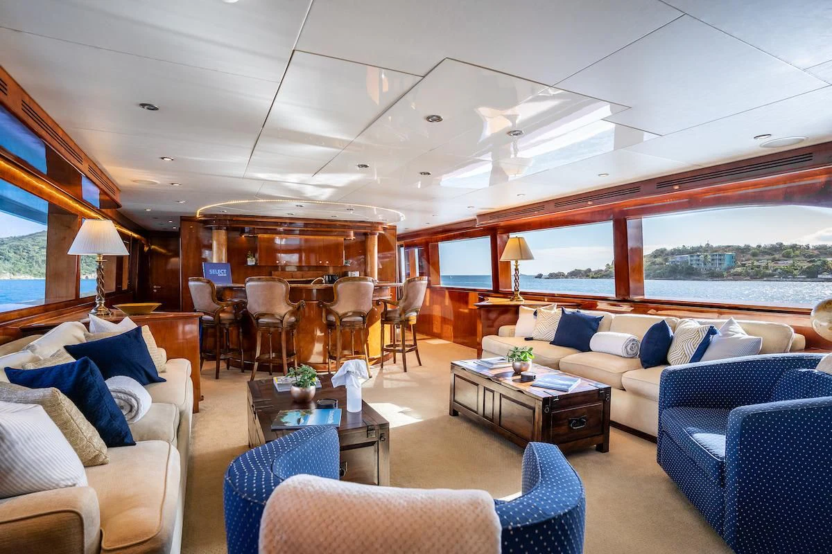 a living room with a large window aboard OUTTA TOUCH Yacht for Sale