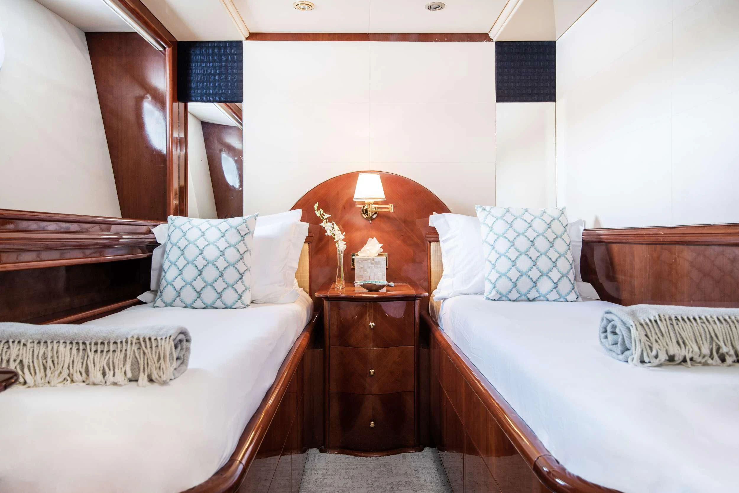 a room with two beds aboard OUTTA TOUCH Yacht for Sale