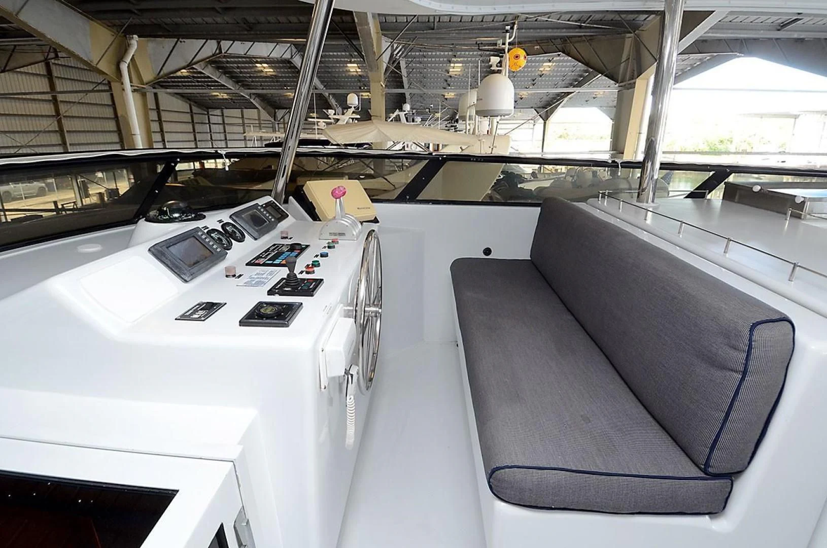 a large room with machines aboard OUTTA TOUCH Yacht for Sale