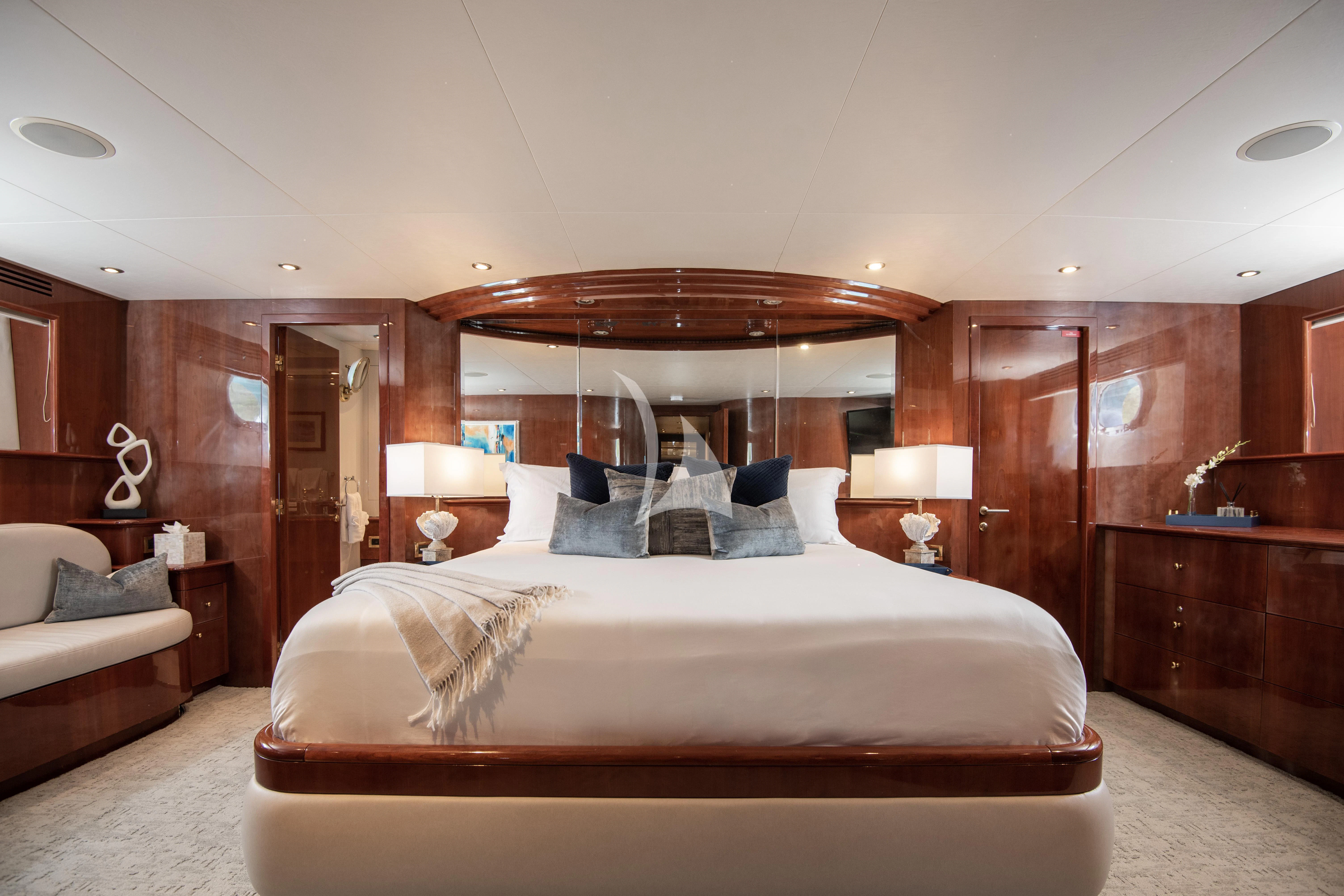 a large bed in a hotel room aboard OUTTA TOUCH Yacht for Sale
