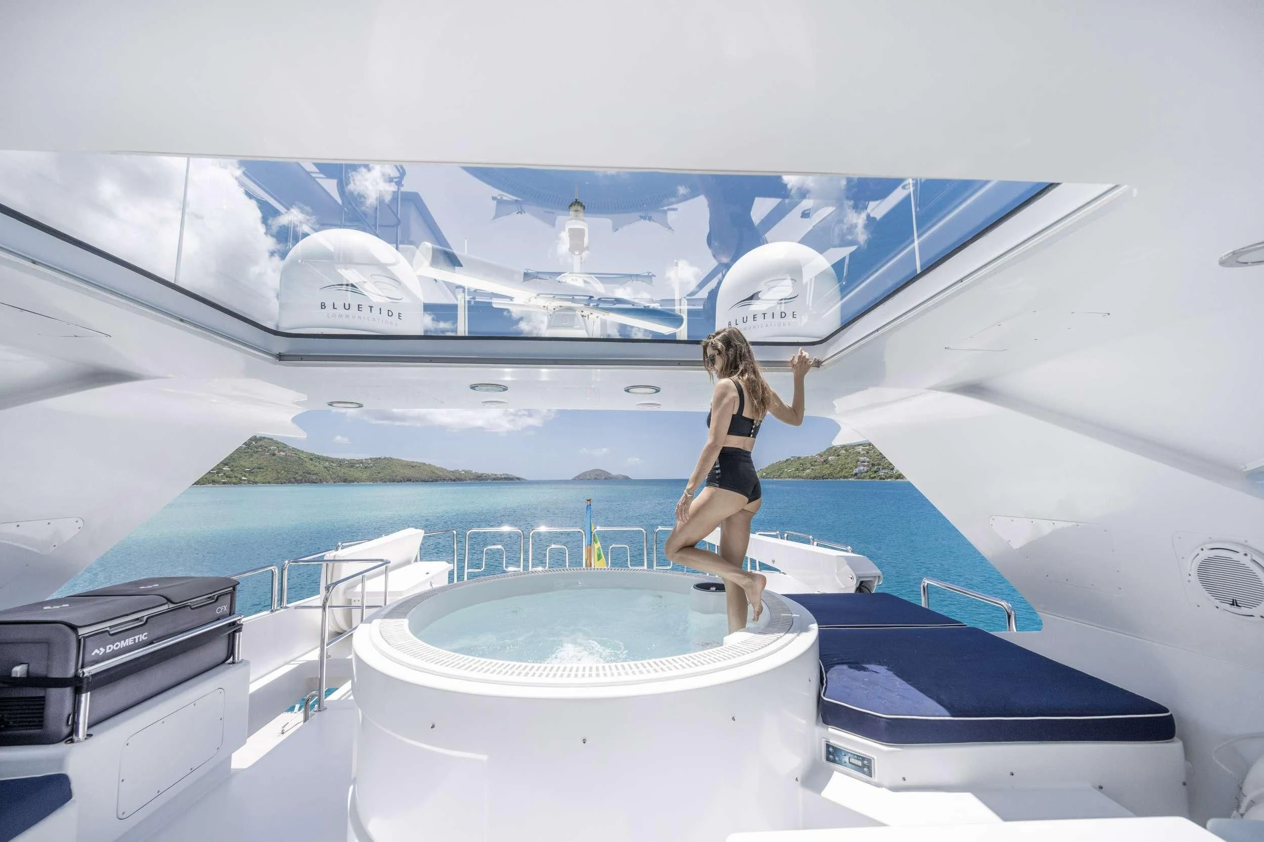 a person walking on a deck aboard OUTTA TOUCH Yacht for Sale