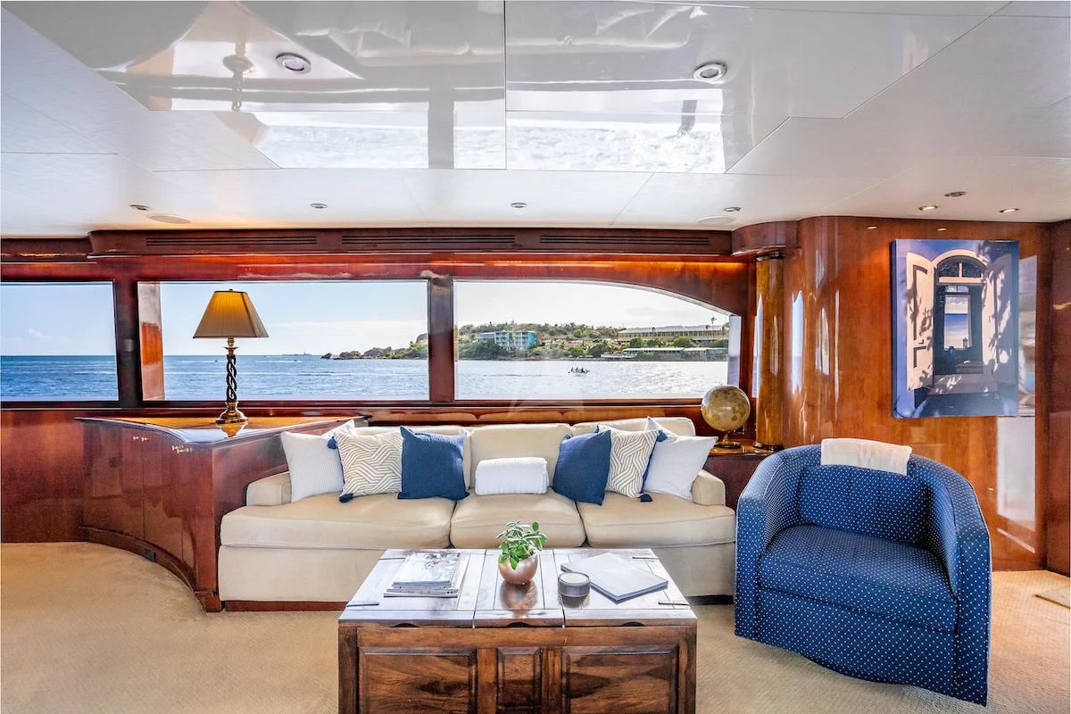 a living room with a large window aboard OUTTA TOUCH Yacht for Sale