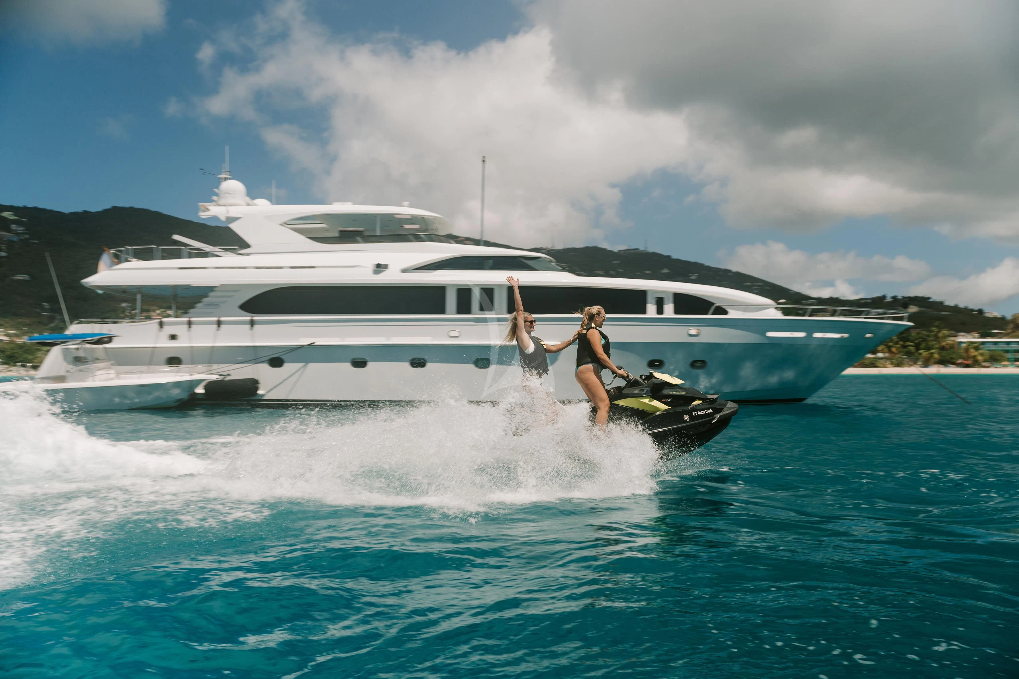 a person on a boat aboard OUTTA TOUCH Yacht for Sale