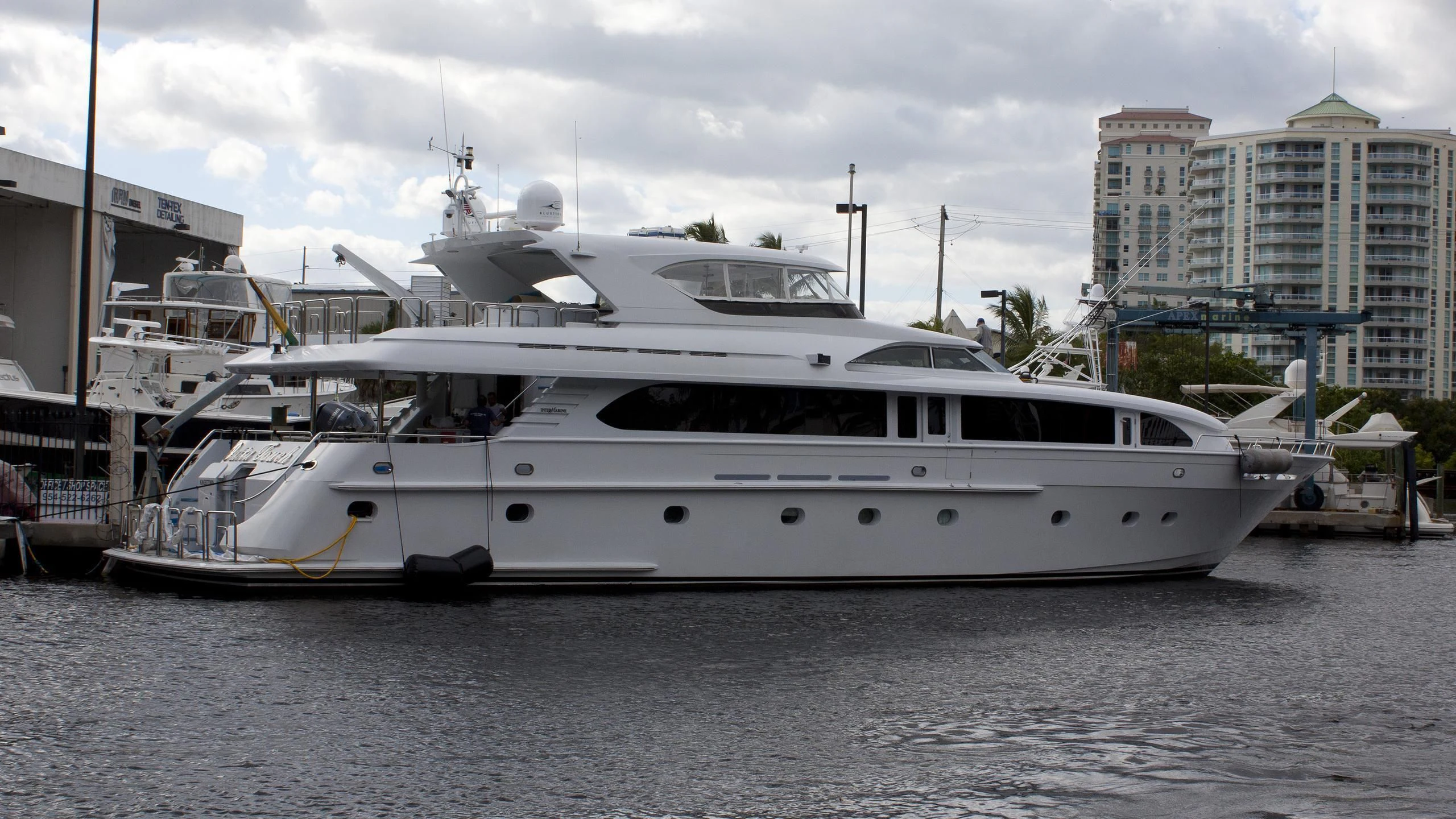 a white yacht docked aboard OUTTA TOUCH Yacht for Sale